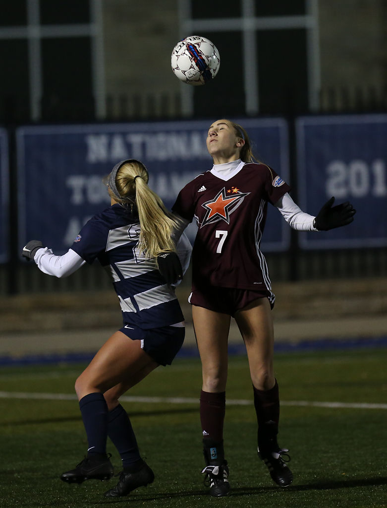 Anya Castelli gets a header